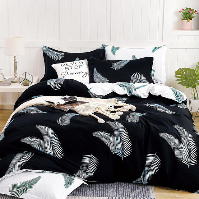 Спално бельо от поликотън – черно и бяло с пера