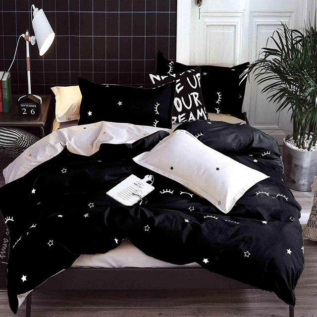 Спално бельо с ластик от 100% памук – черно и бяло с мигли и звезди