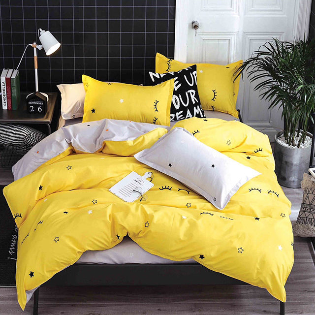 Единично спално бельо с ластик – жълто и сиво с мигли и звезди