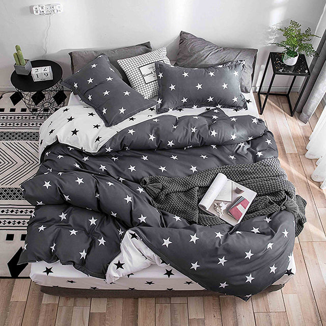 Единично спално бельо с ластик – черно и бяло със звездички